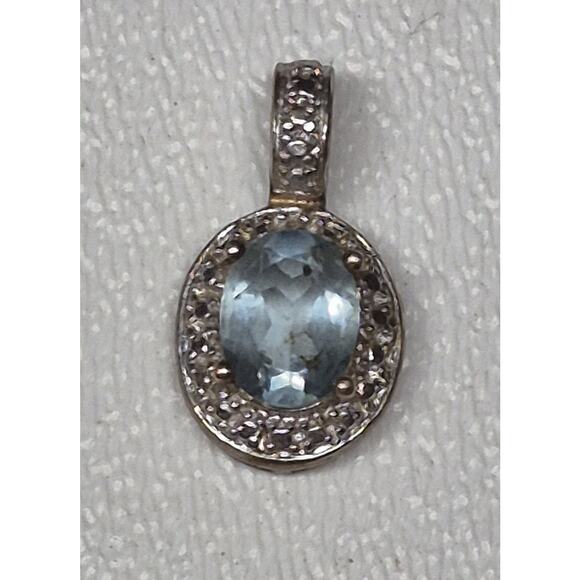 Blue Stone Surrounded by White Stones Set in Silver Pendant - Picture 1 of 3